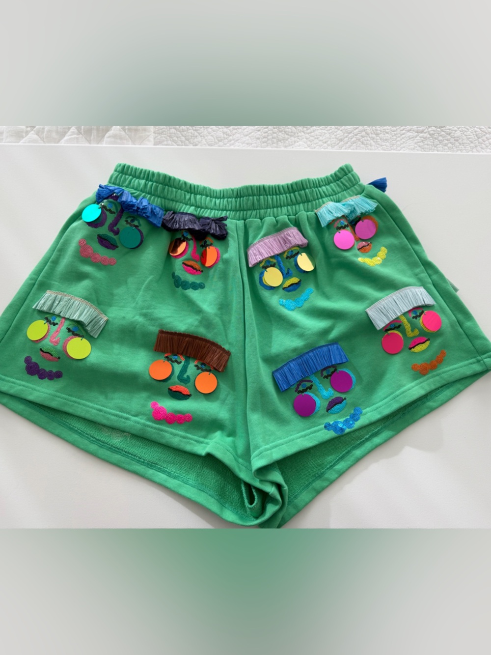 QUEEN OF SPARKLES Green Embellished Fringe Face Shorts